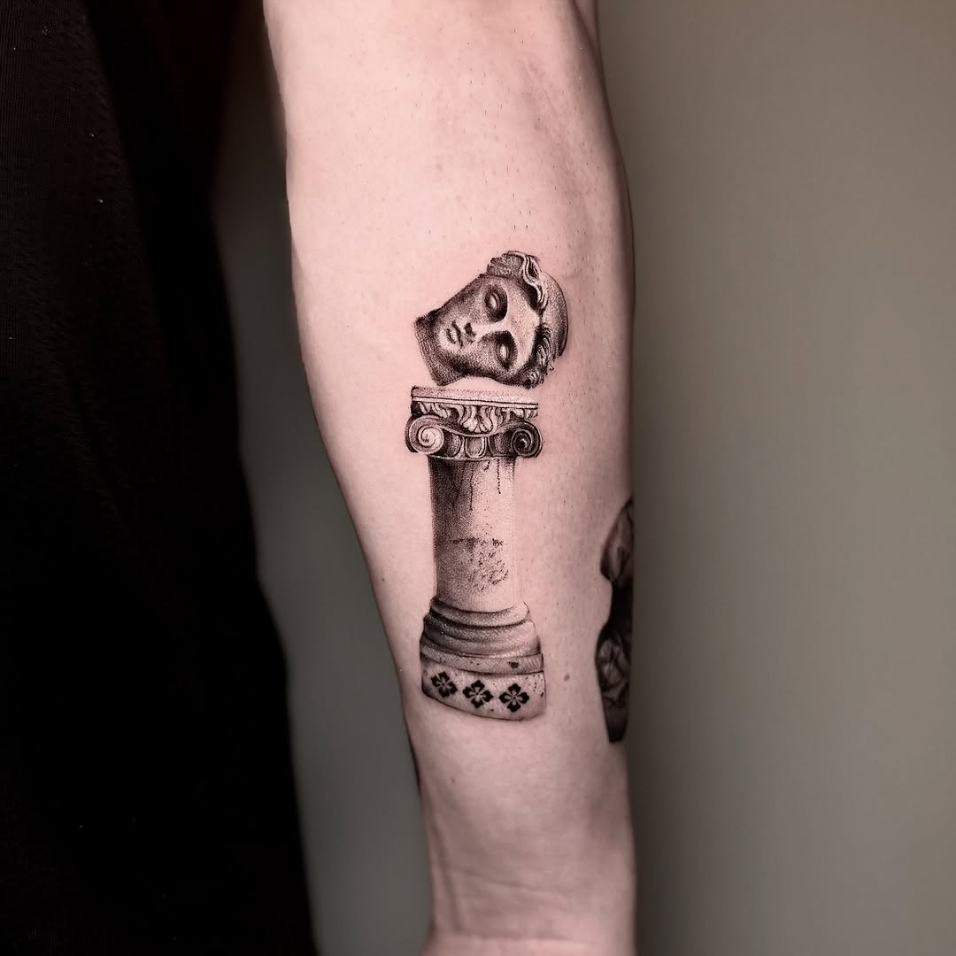 Classical bust on ornate column, fine black-and-gray shading