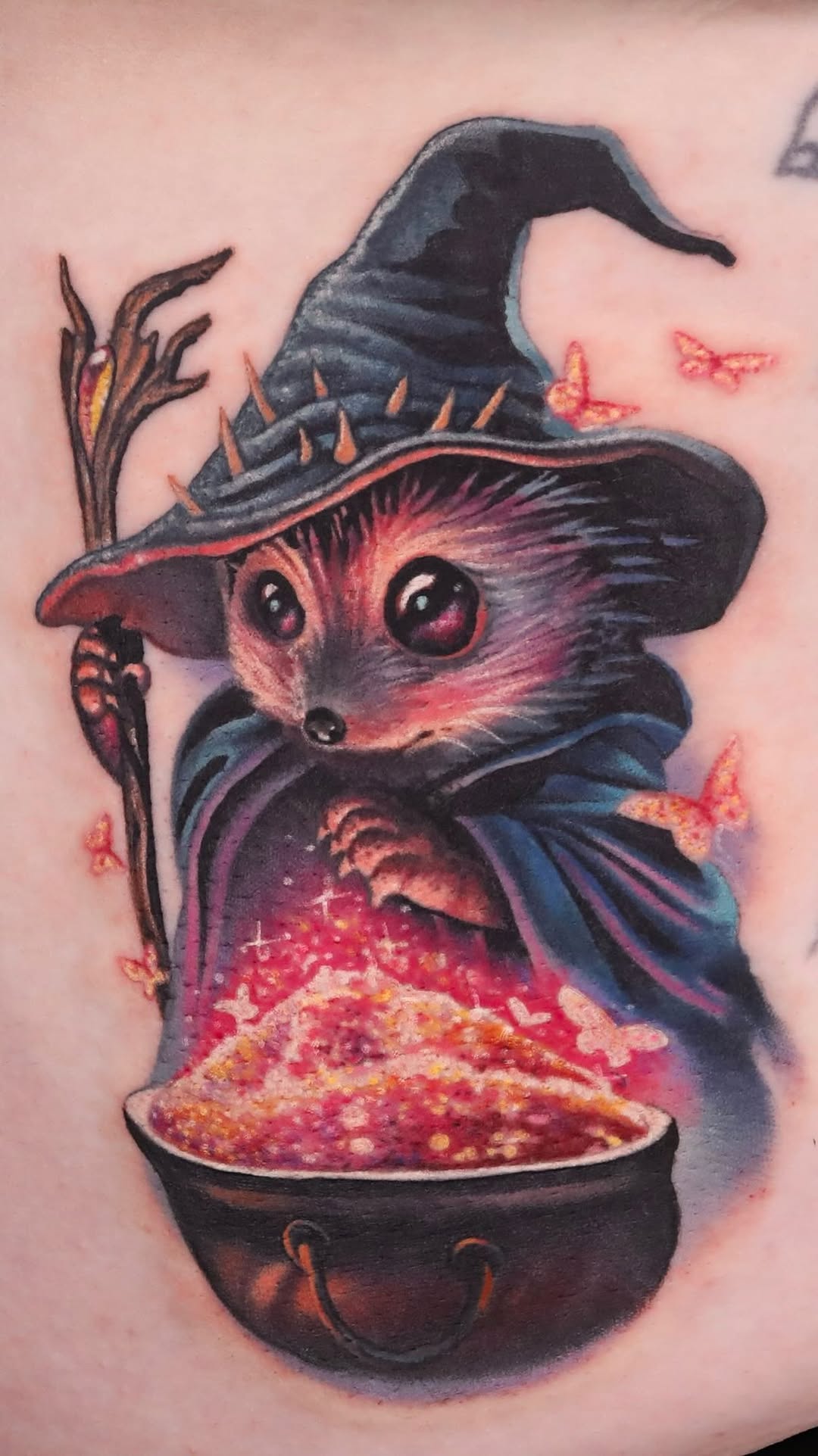 Whimsical rodent witch with glowing cauldron
