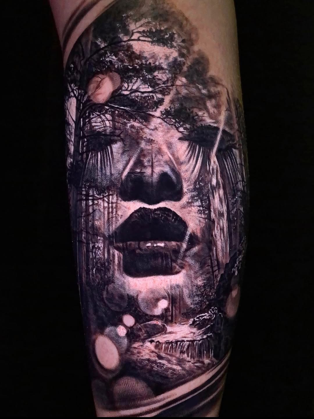 Double exposure face dissolving into trees, grayscale realism.