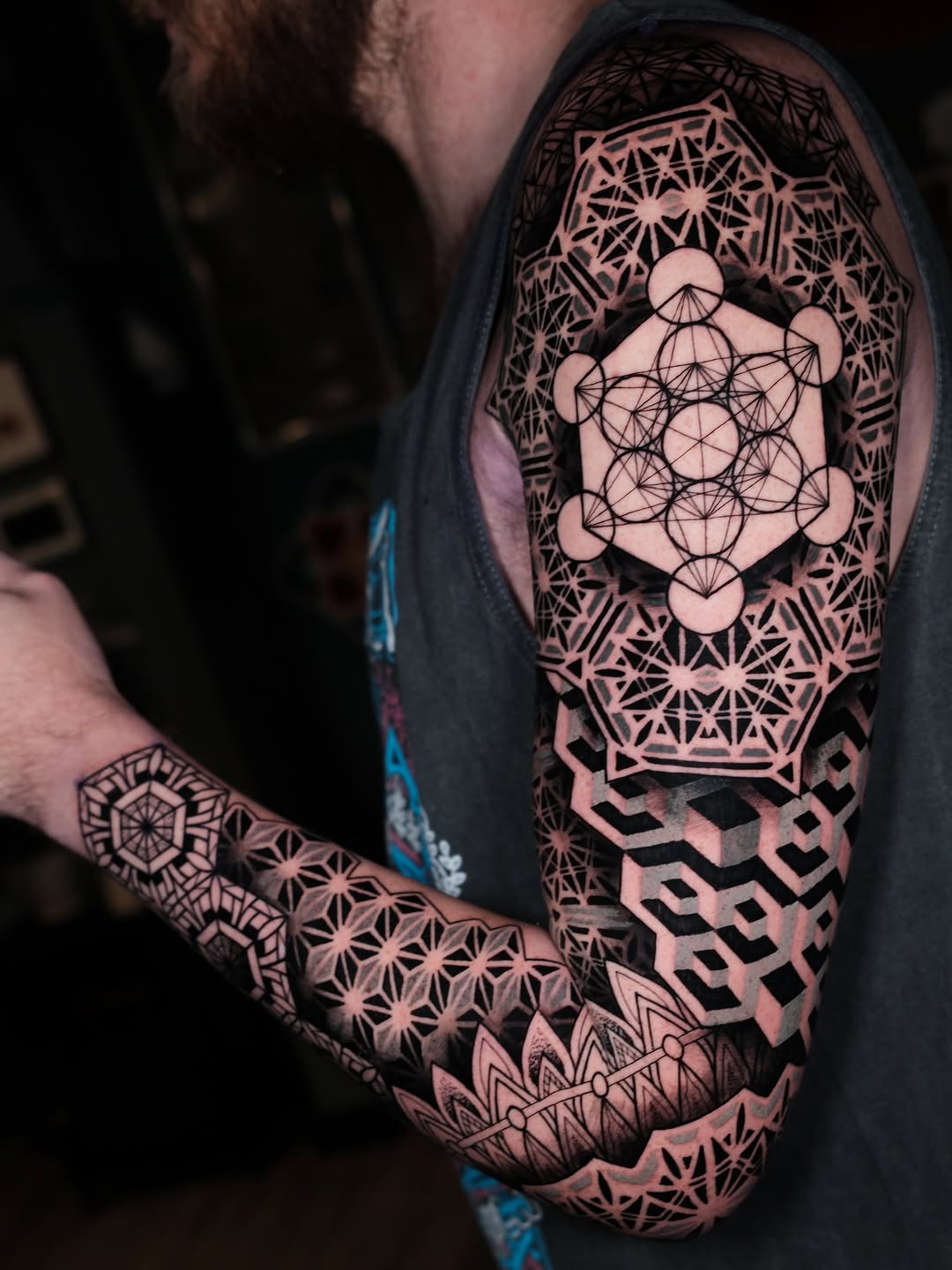 Intricate geometric Metatron's cube sleeve with bold linework