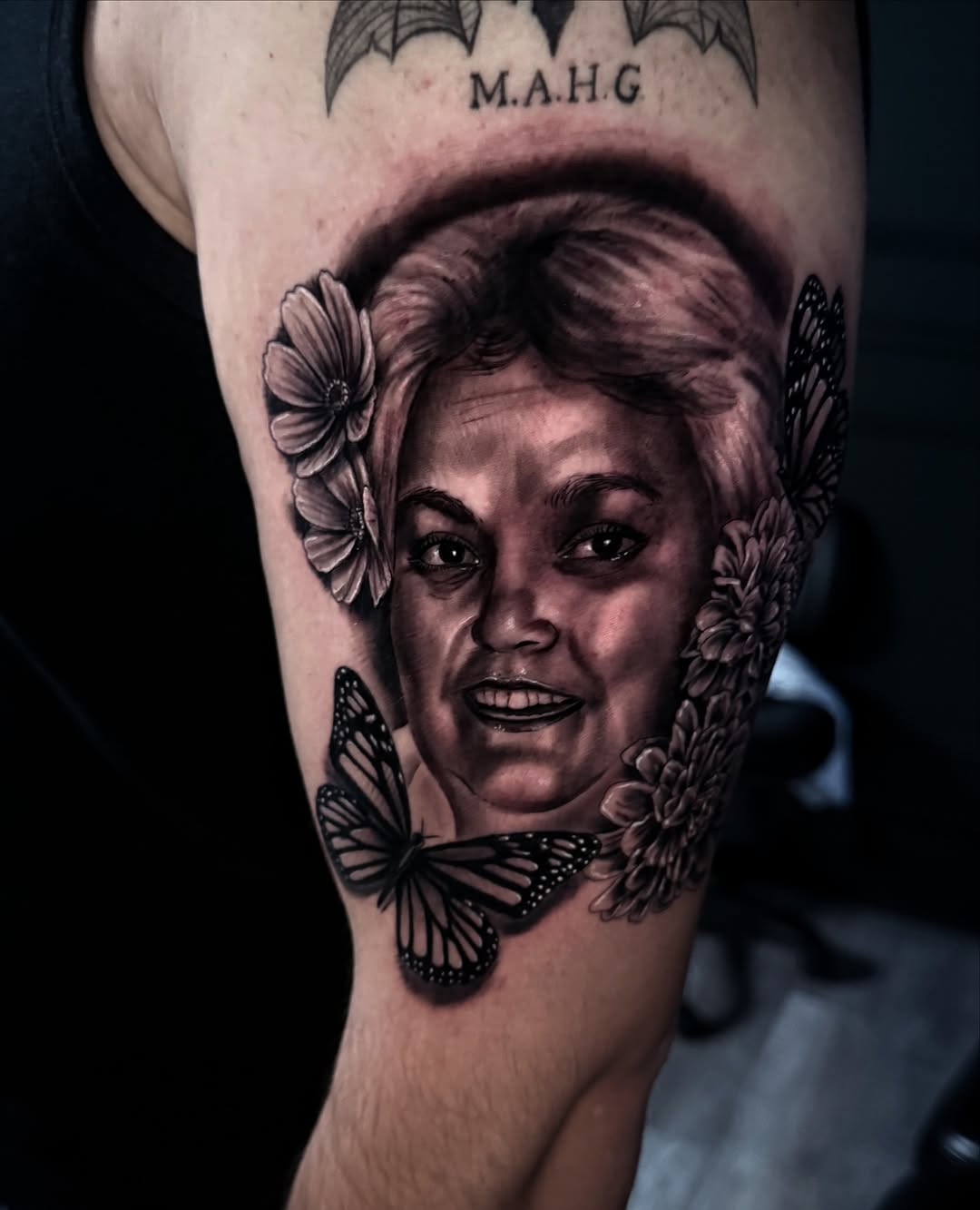 Hyper-realistic female portrait with flowers and butterflies.