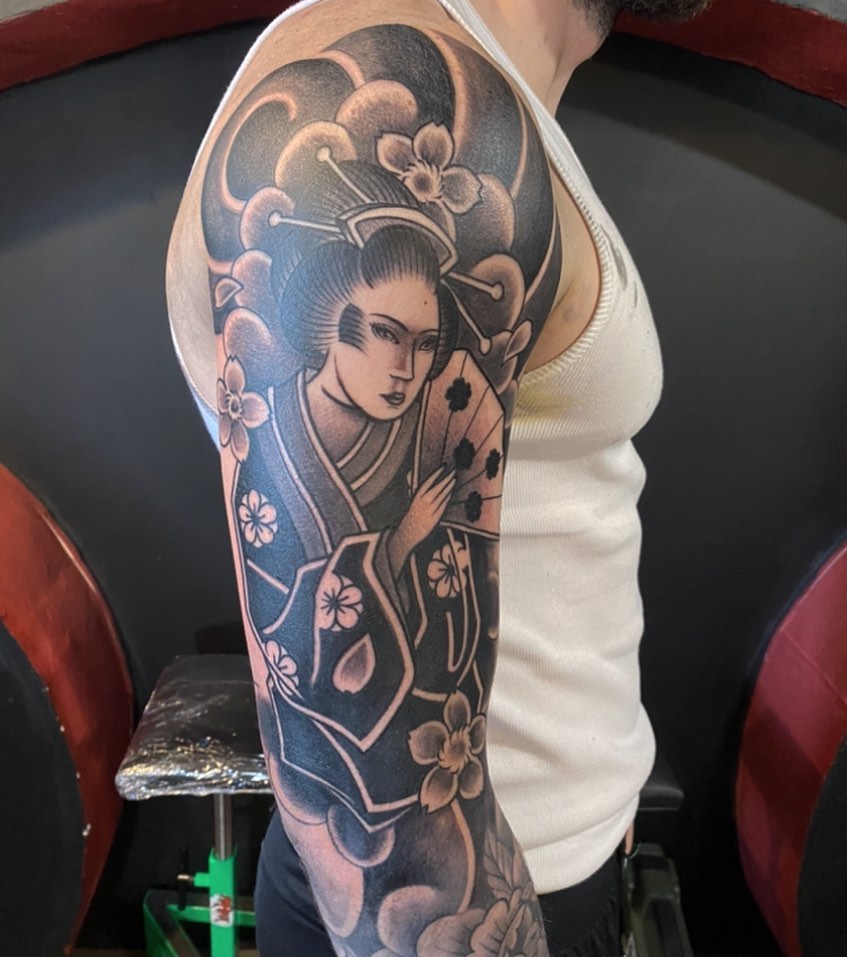 Monochrome geisha sleeve with blooming cherry blossoms.