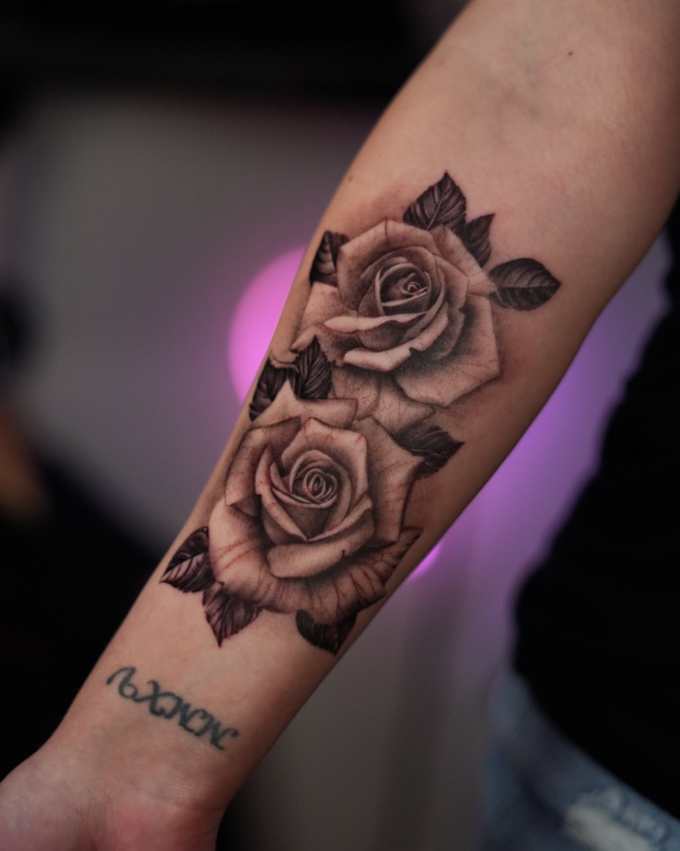 Hyper-detailed grayscale rose duo with lush shading