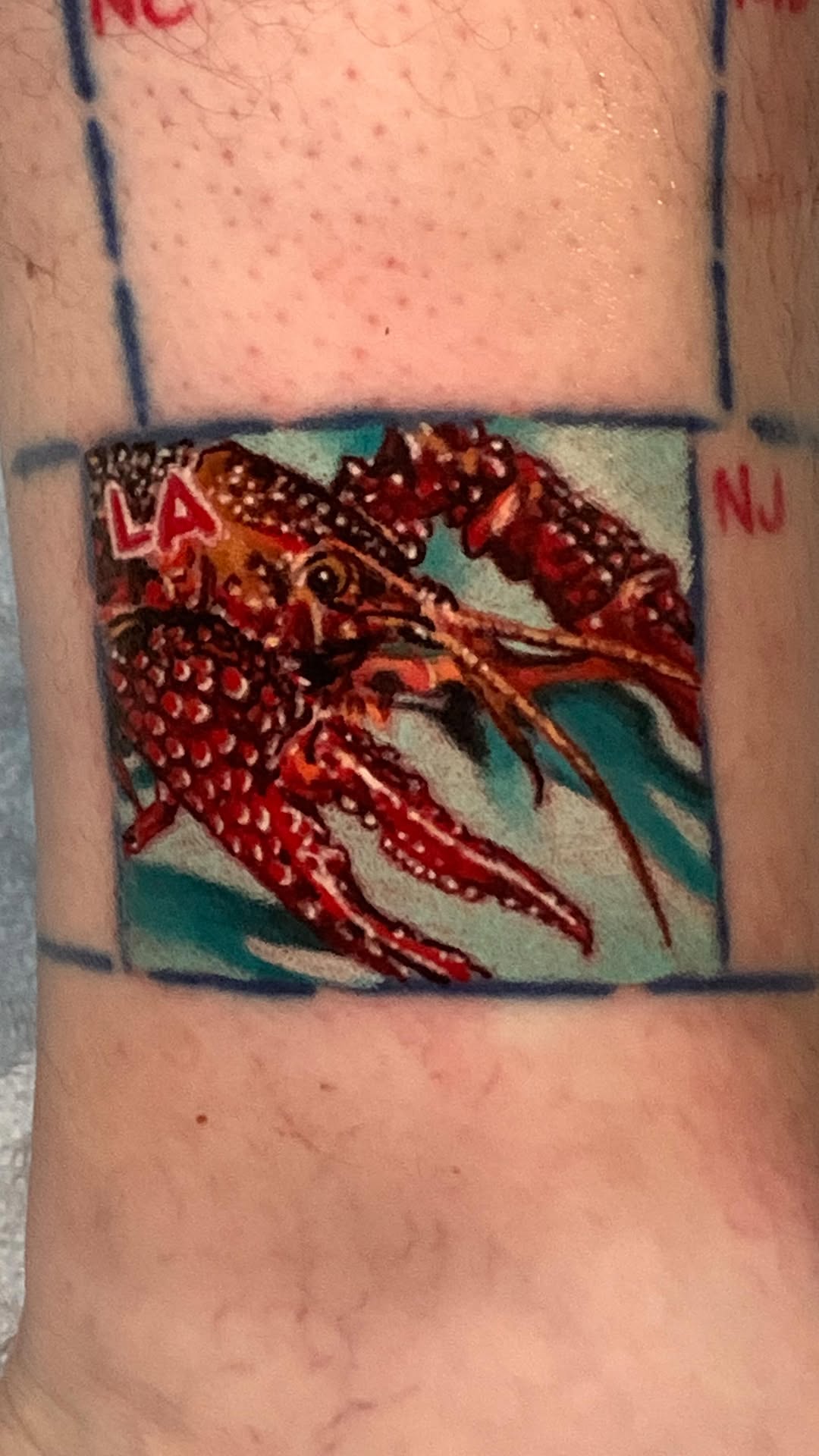 Vivid red octopus with ornate suckers, Louisiana homage