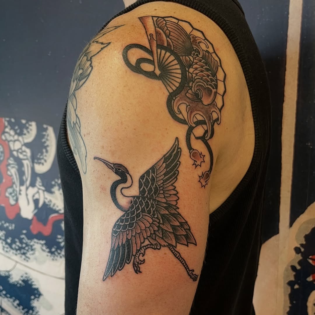 Bold blackwork crane with dragon motif, Japanese-inspired.