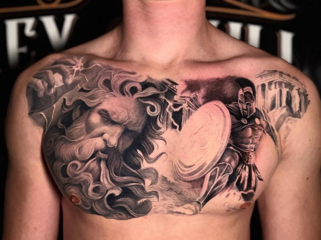 Monumental grayscale mythic chest piece with deity and warrior