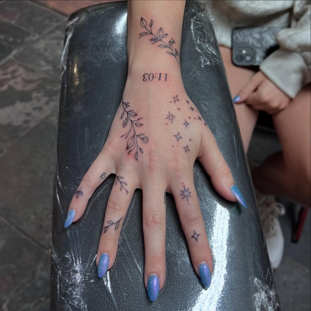 Delicate fine-line vines entwine with starry accents