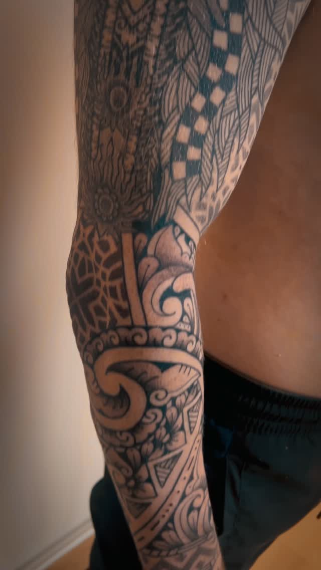 Intricate Indonesian-patterned sleeve with Balinese ornament motifs