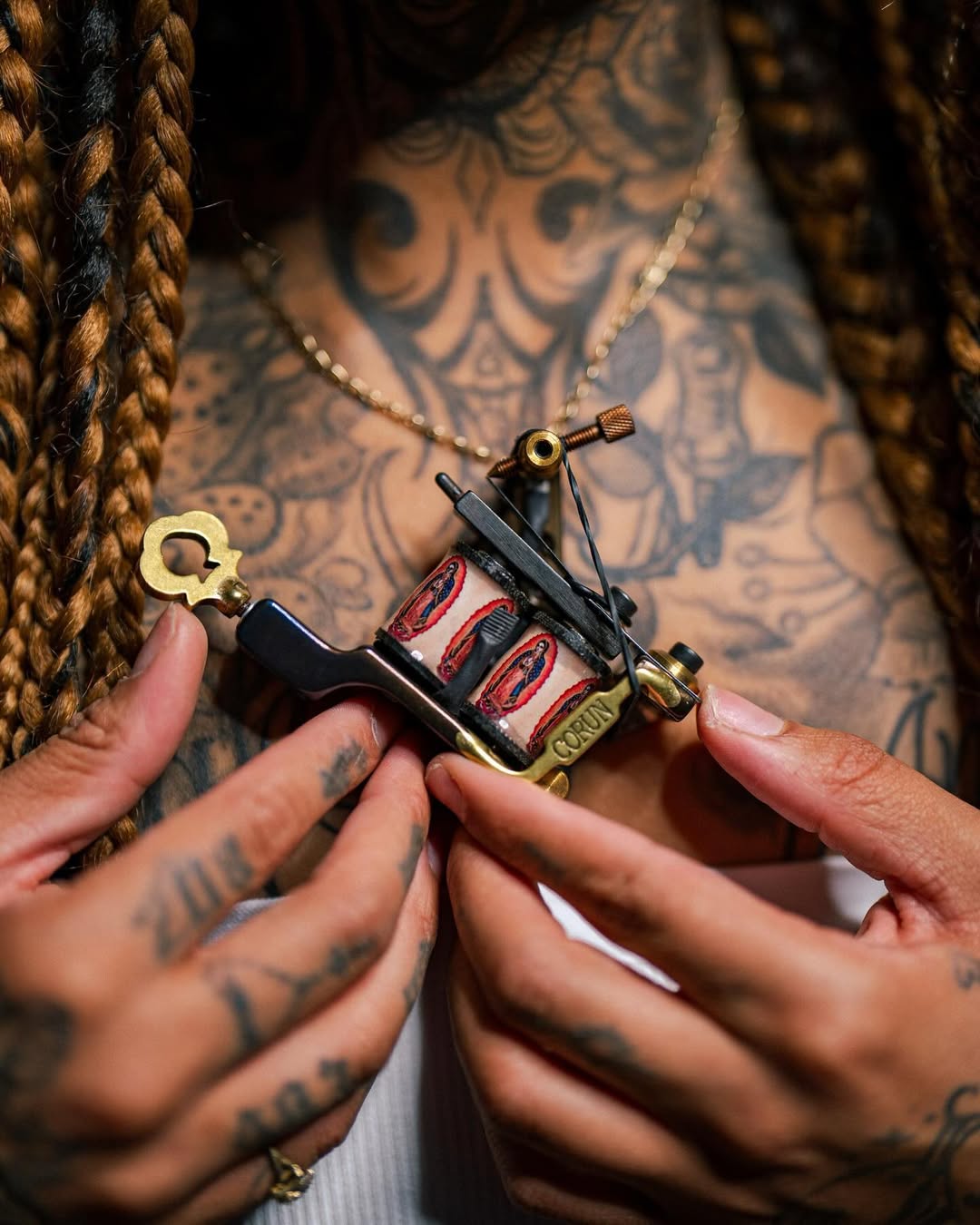 Bold blackwork chest piece with intertwined ornamental motifs.