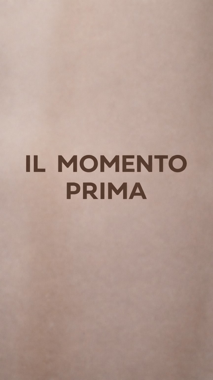 Bold uppercase sans-serif text tattoo on skin.