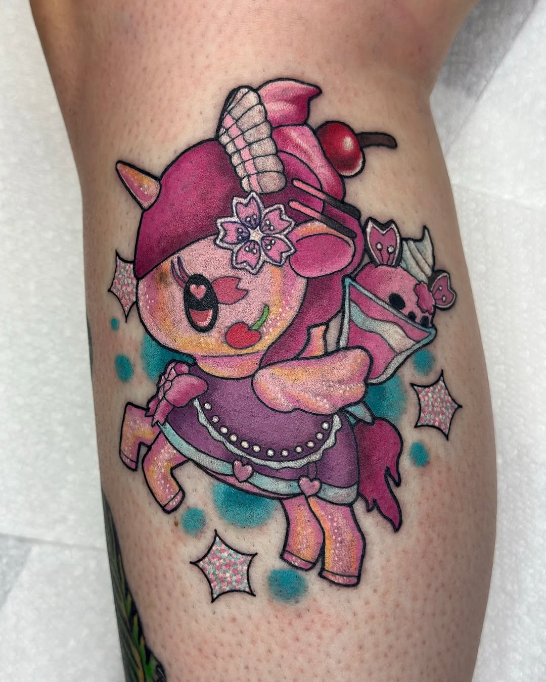 Playful Tokidoki unicorno in pinks with floral accents