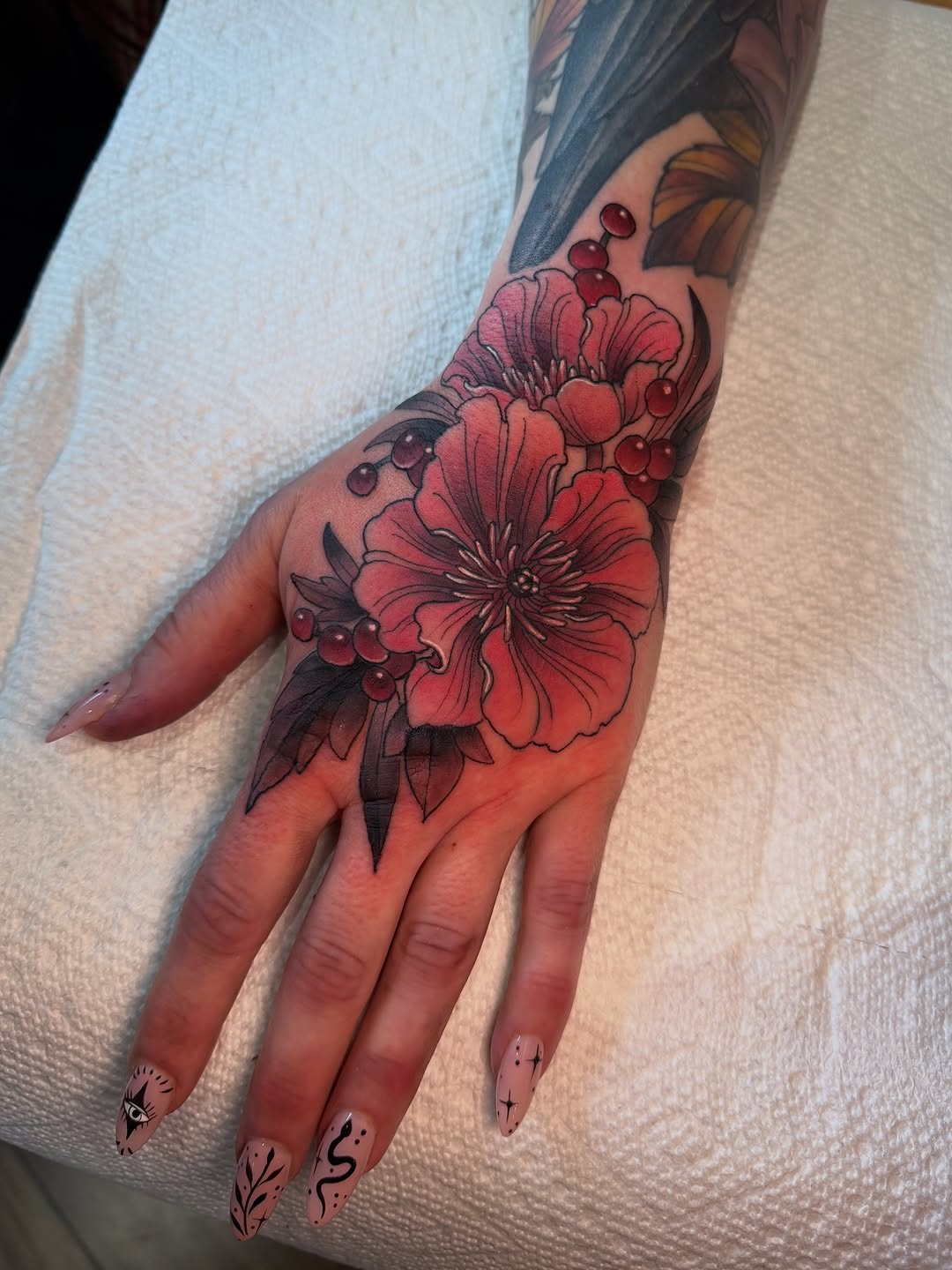 Vivid red peony with bold linework and berry accents