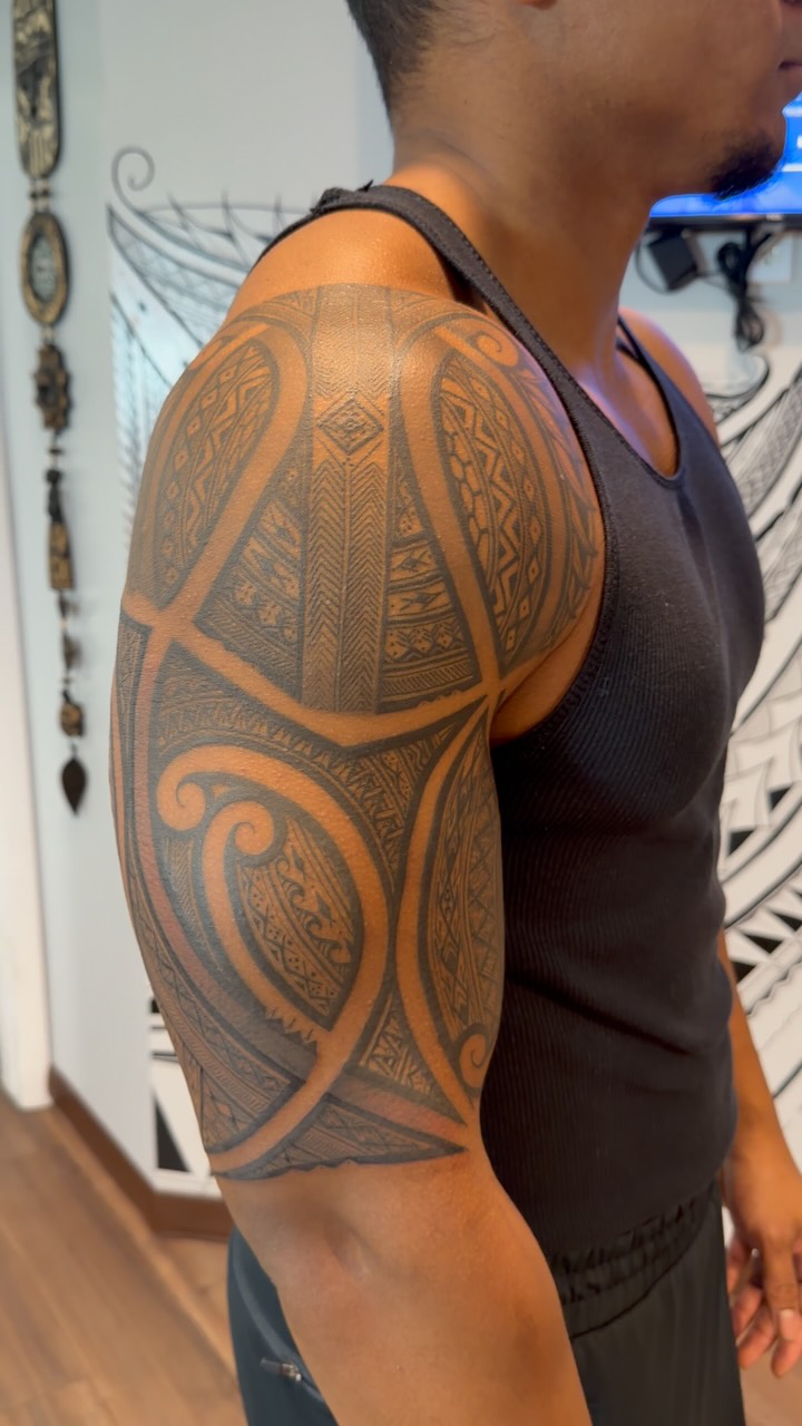 Bold Polynesian tribal pattern with intricate geometric detailing