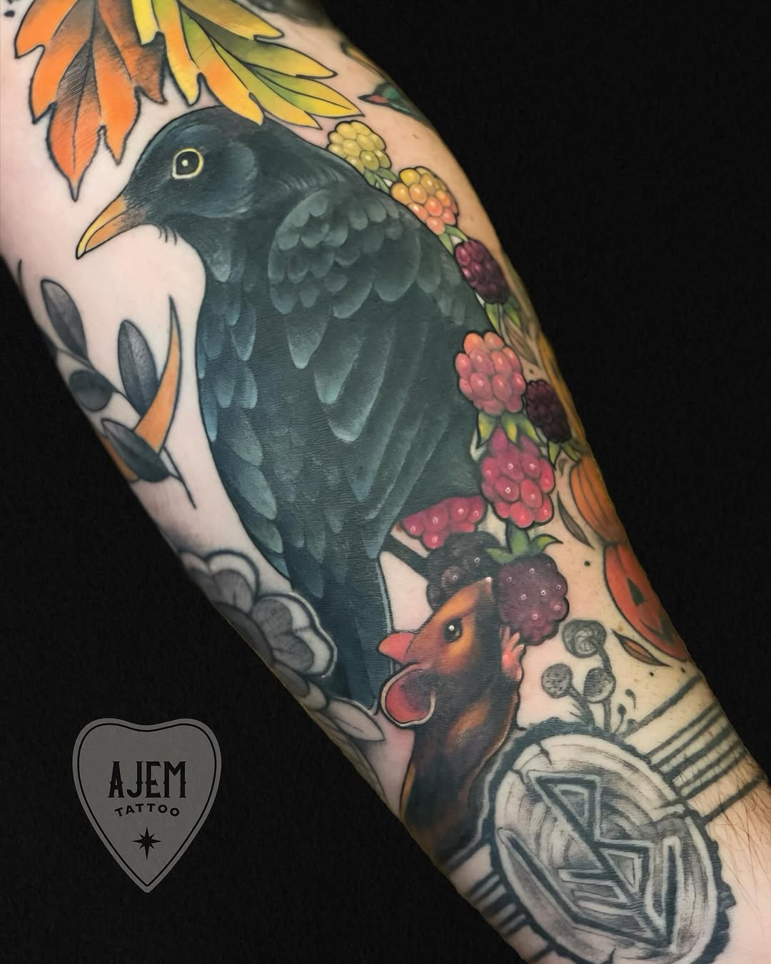 Bold raven centerpiece with autumn berries and leaves