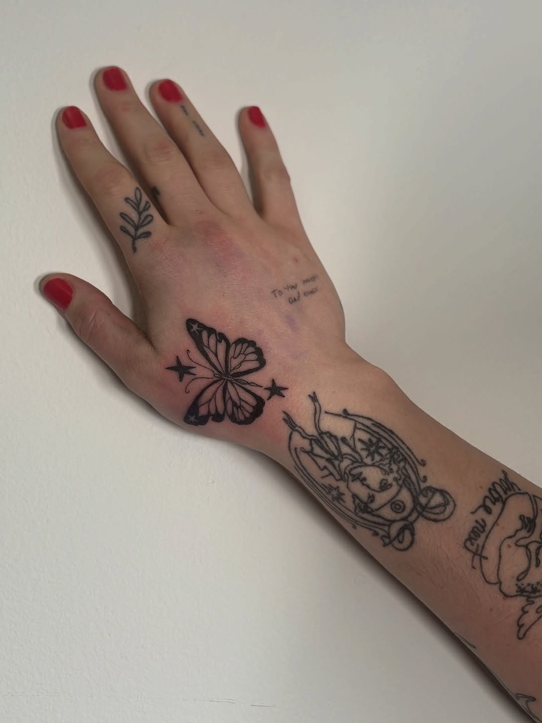 Butterfly tattoo on hand