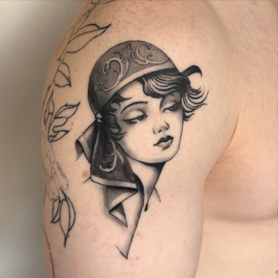 Vintage cameo portrait with hat, scarf, bold grayscale shading