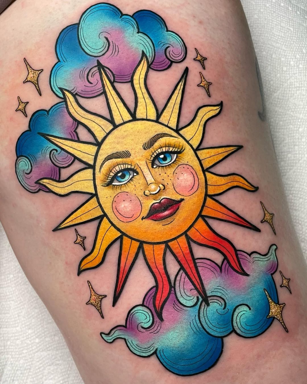 Bold cartoon sun with rosy cheeks amid pastel clouds.