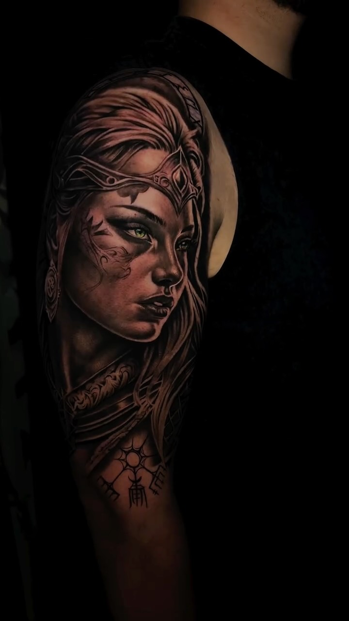 Dramatic black-and-gray Valkyrie portrait with intricate helm