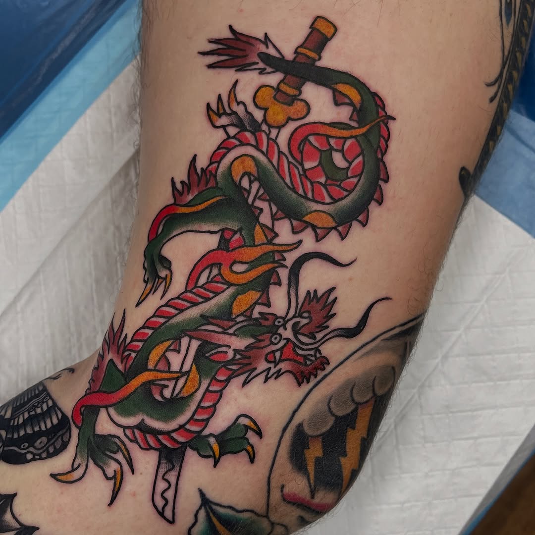 Bold Japanese dragon, serpentine body in vibrant hues.