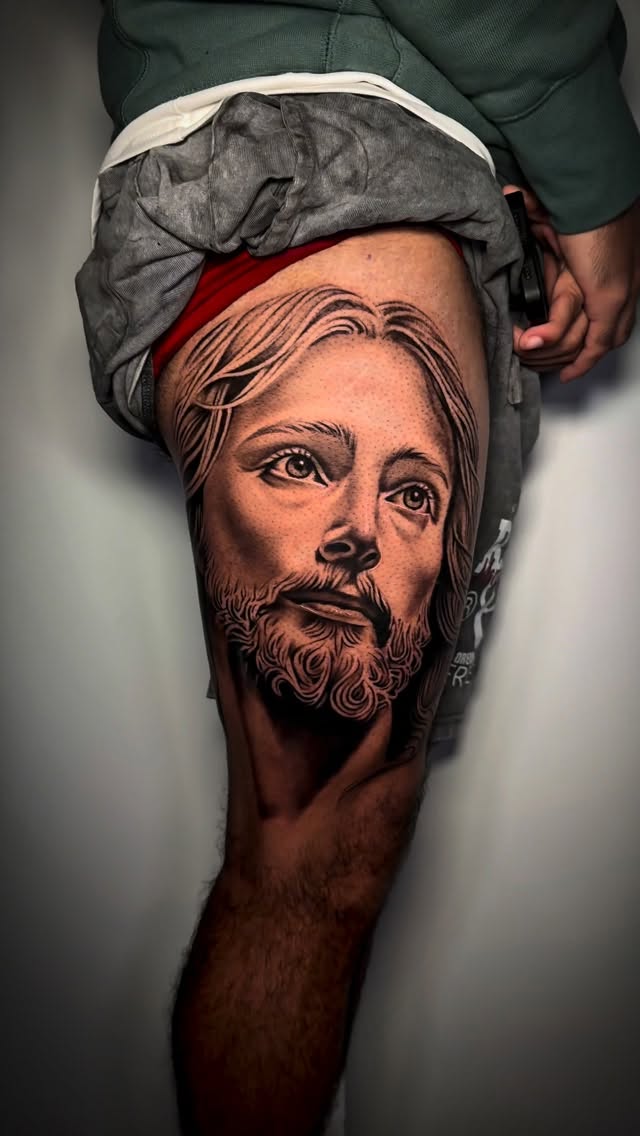 Religious black-and-gray Jesus portrait with soft contrast.