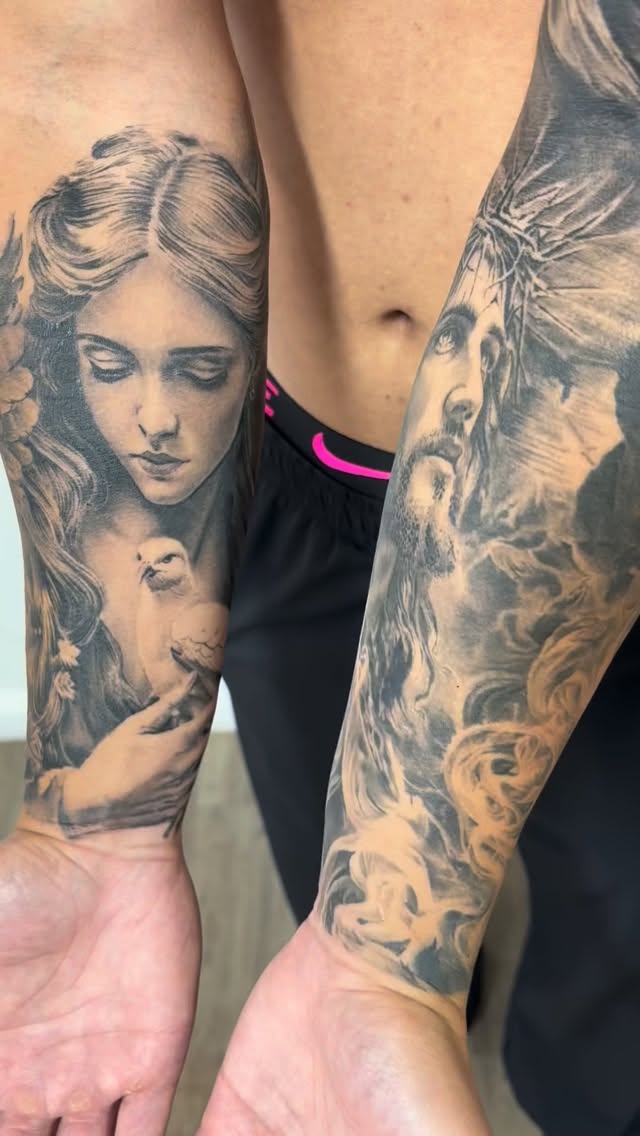 Realistic black-and-gray religious forearms with serene figures and dove