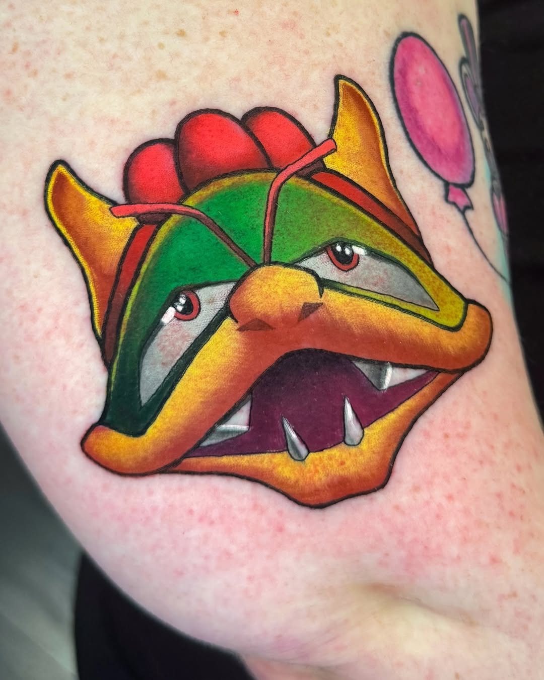 Vibrant cartoon dragon head with bold outlines