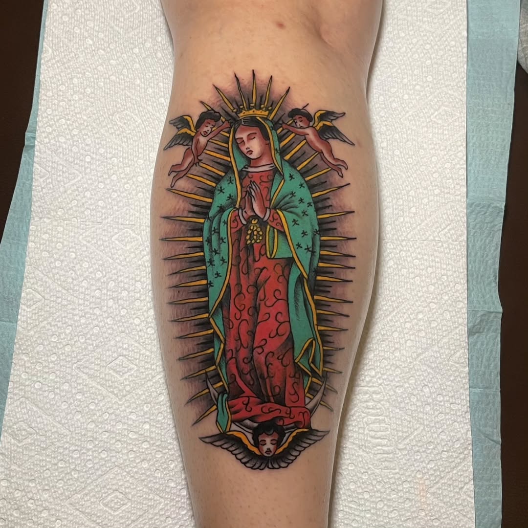 Vivid Guadalupe Virgin with teal mantle and radiant halo.