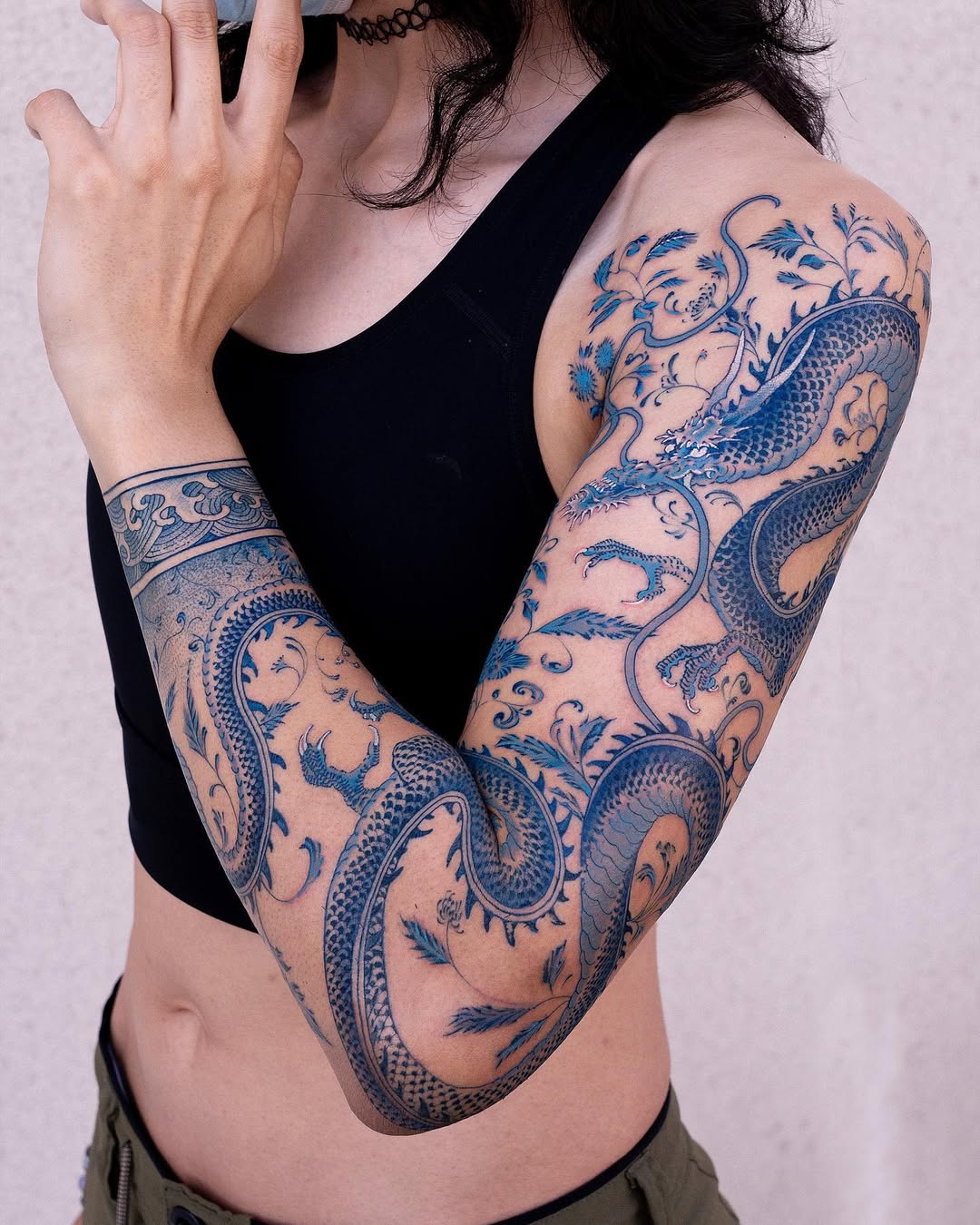 Ceramic-blue dragon sleeve entwined with delicate floral vines