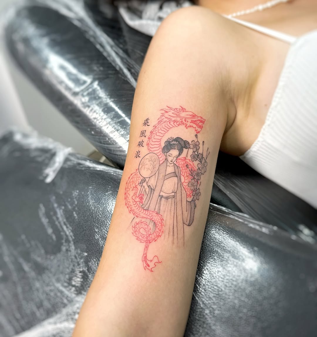 Geisha and red dragon, fine-line Japanese-inspired tattoo