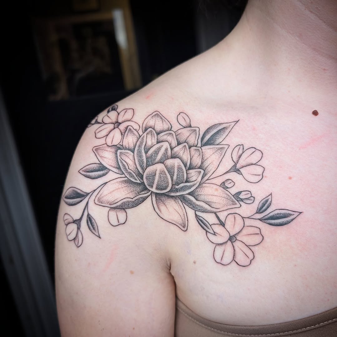 Delicate shoulder floral bouquet with bold linework.