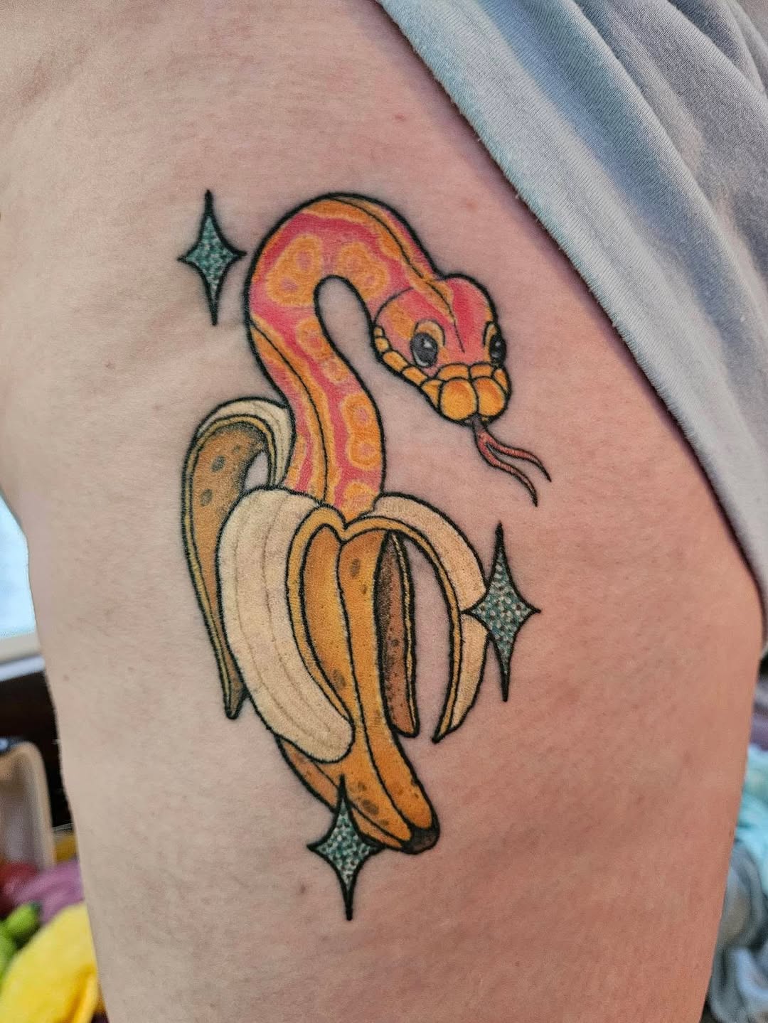 Bright cartoon banana ball python with bold outlines