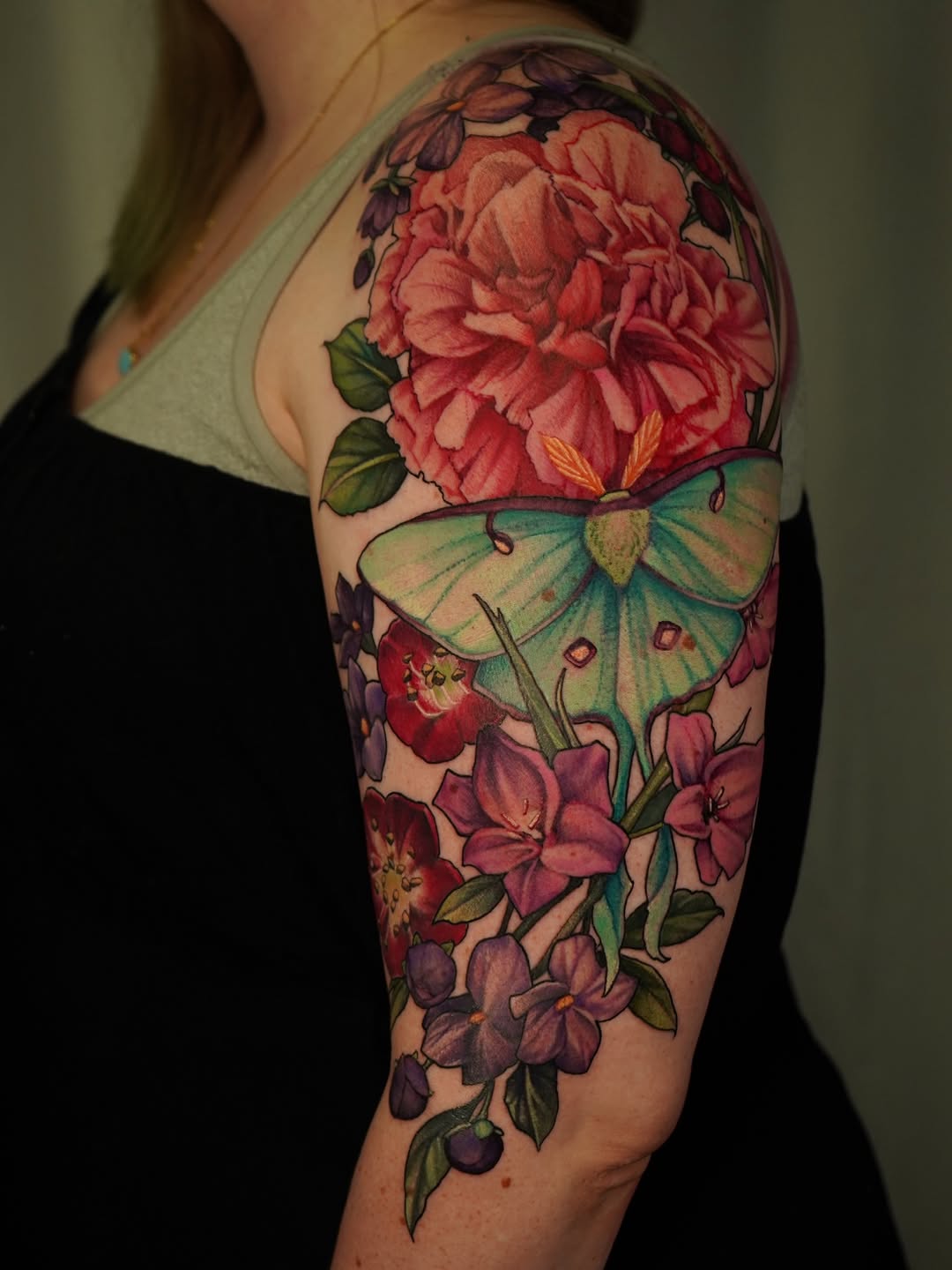 Vibrant botanical sleeve with pink peony and butterfly