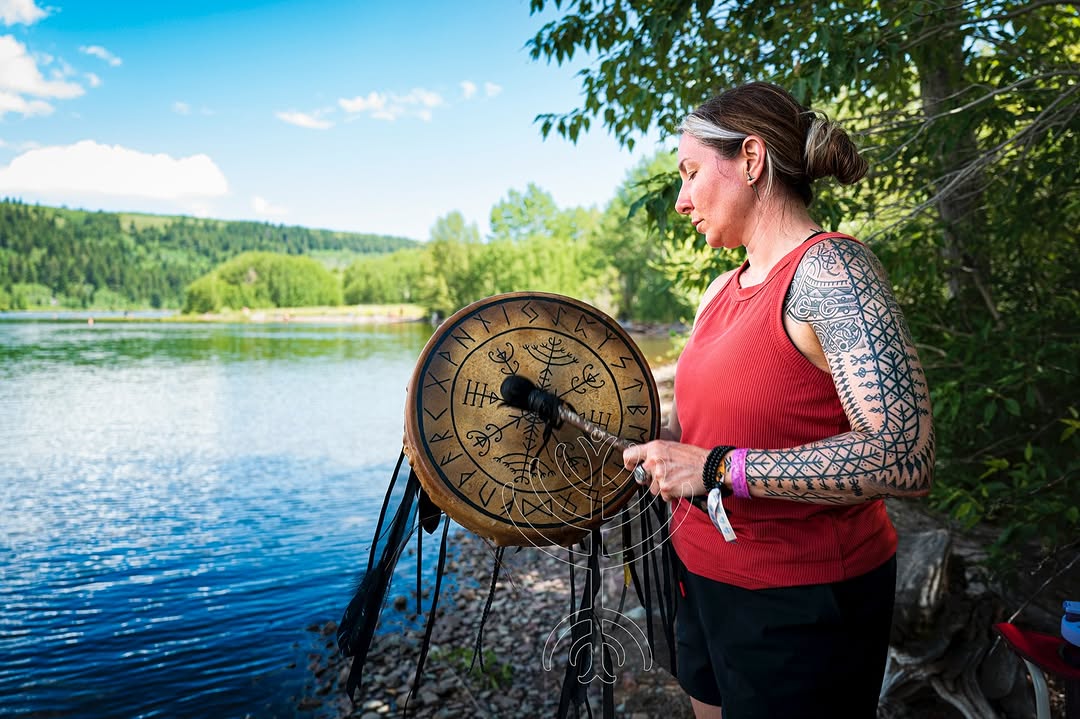 Bold geometric blackwork sleeve with intricate linework.