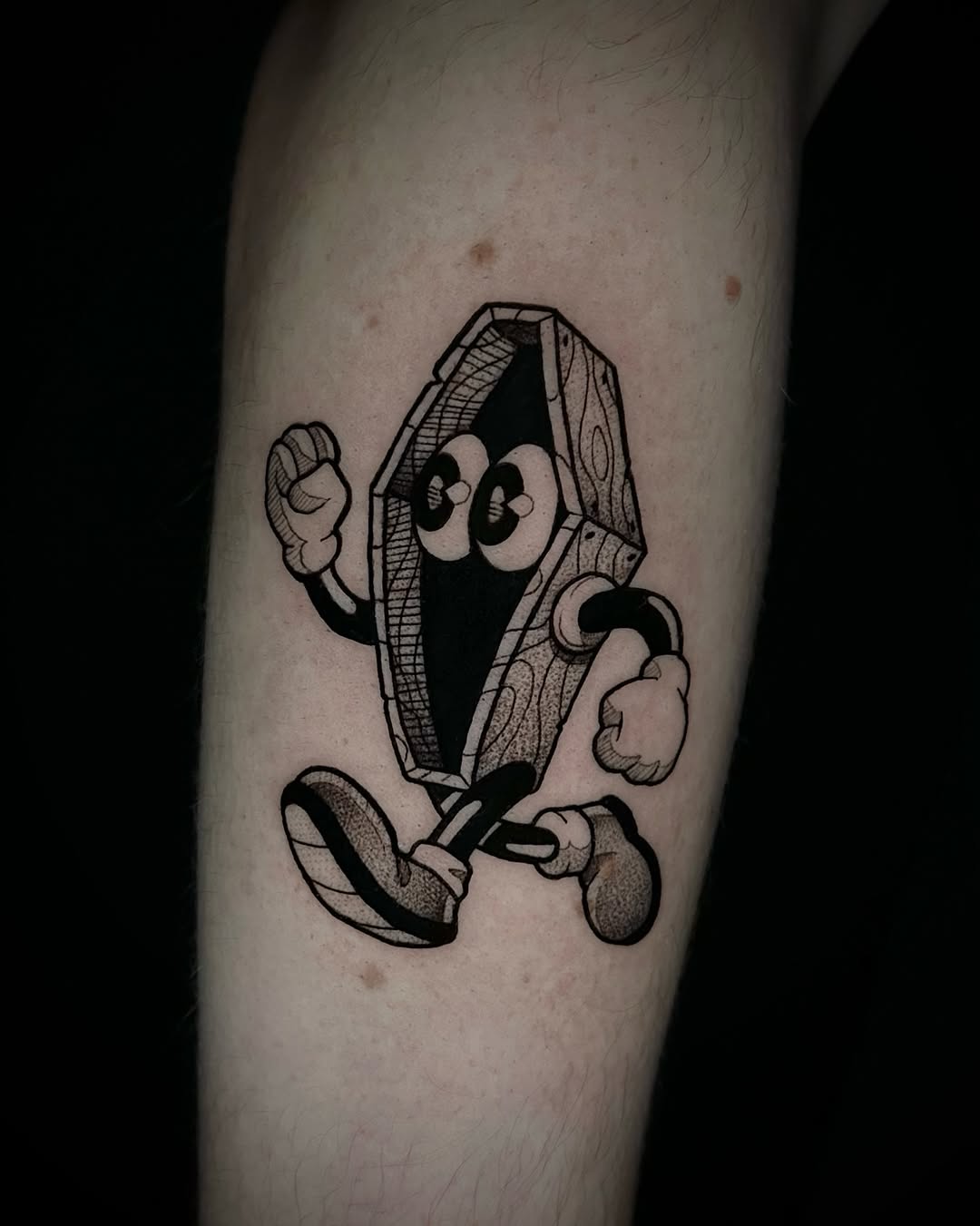 Rubber-hose coffin cartoon runs with bold lines