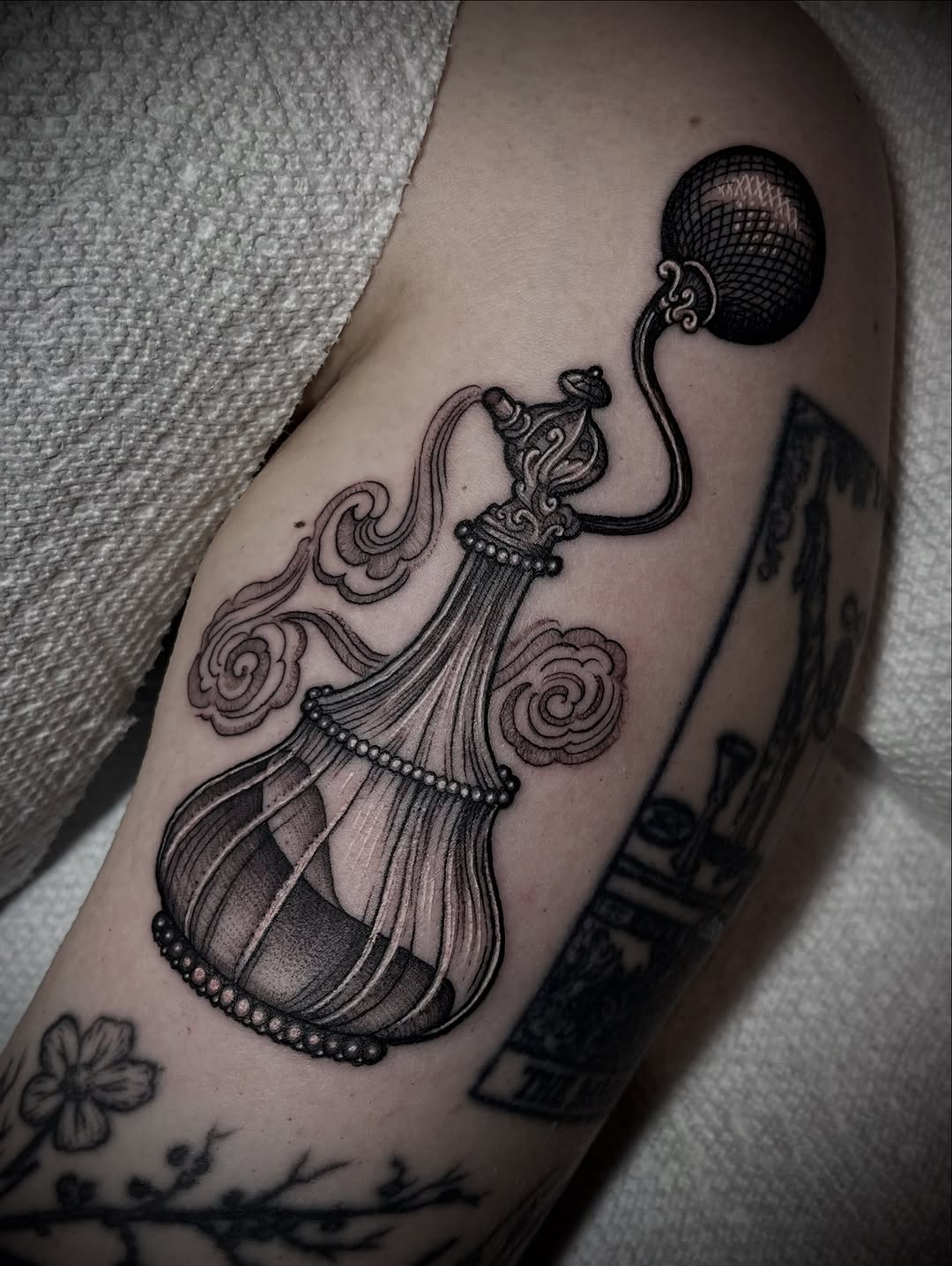 Intricate ornamental tassel with beaded fringe and ornate top