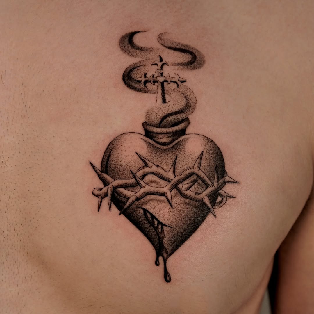 Bold blackwork heart with barbed-wire crown and dripping blood