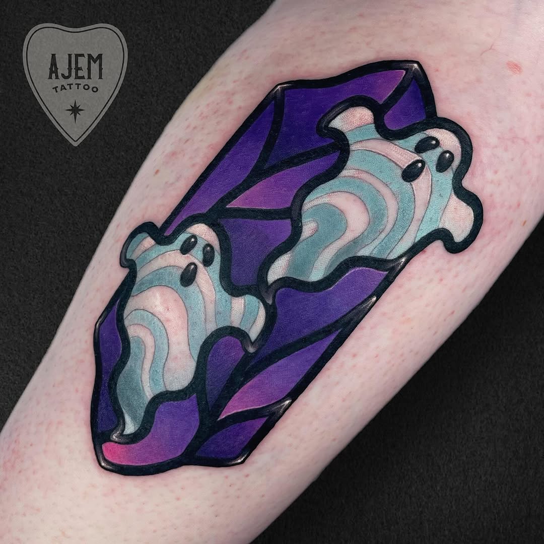 Stained-glass ghost mosaic in vivid purples and teal