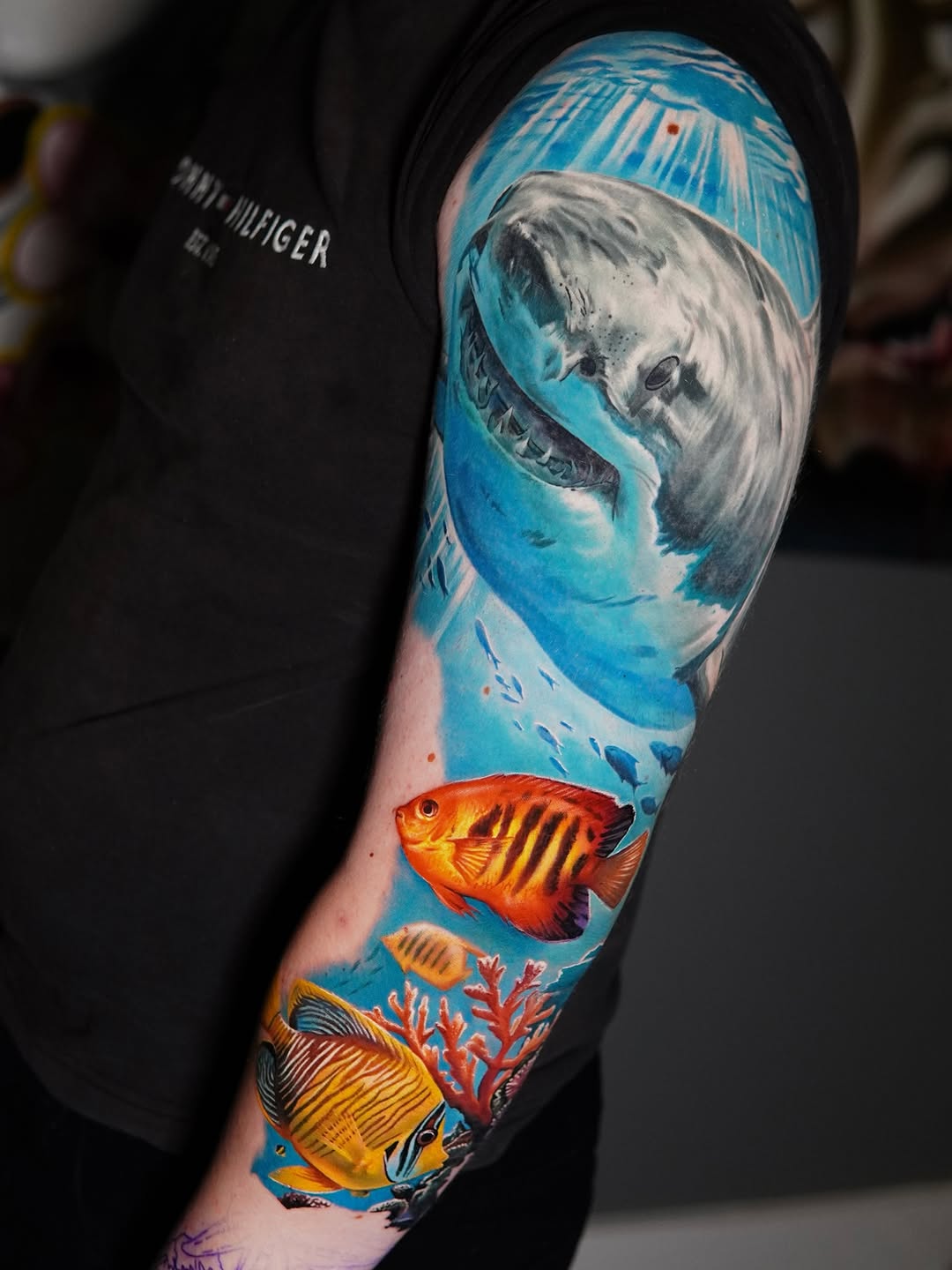 Vibrant underwater sleeve featuring a lifelike shark and reef fish