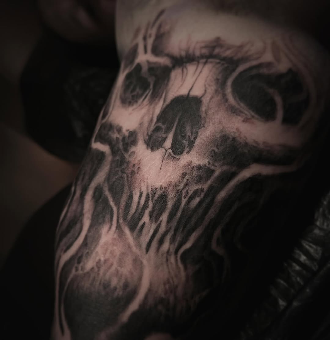 Nightmare surrealism skullscape with flowing blackwork shading