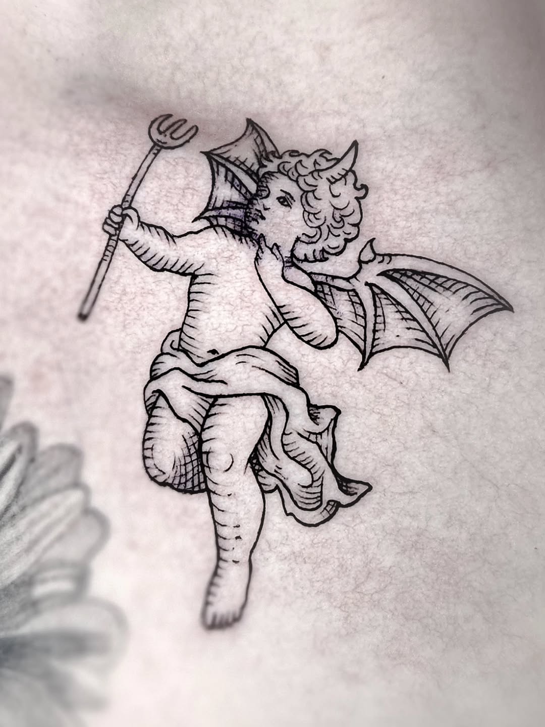 Playful cherub-demon with bat wings and trident.