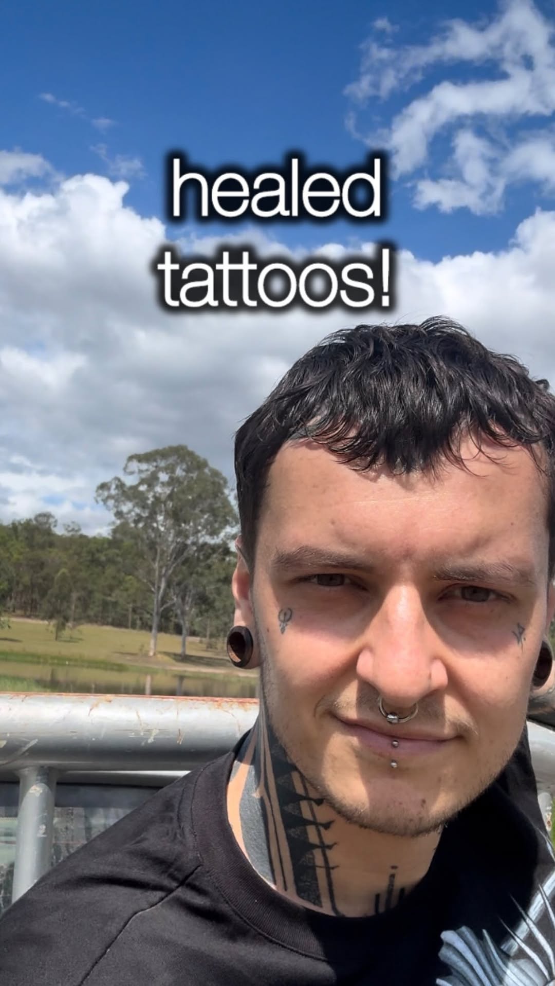 Bold black geometric neck piece with sharp lines