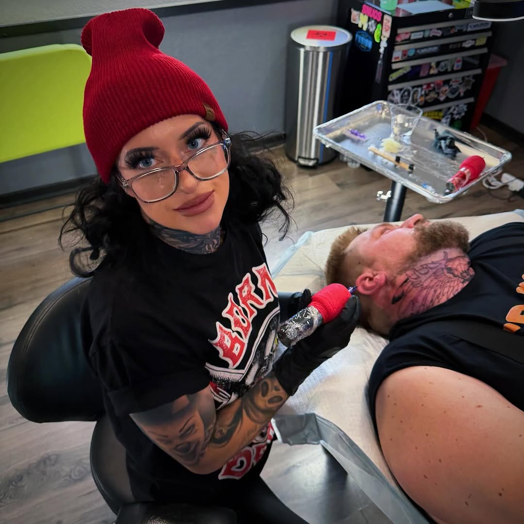 Fresh neck tattoo with bold blackwork and fine-line shading