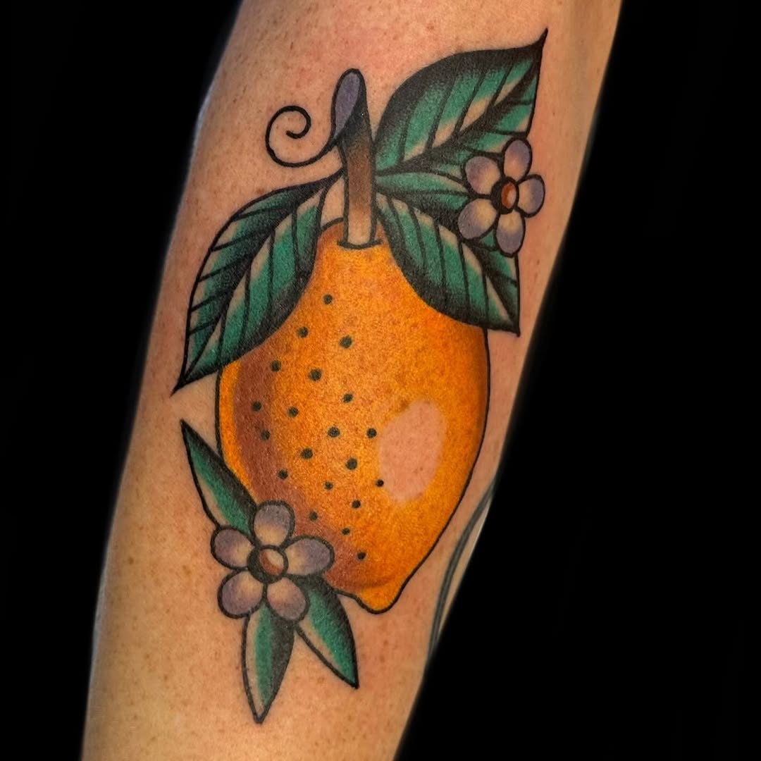 Bold traditional lemon with vibrant greens and blossoms