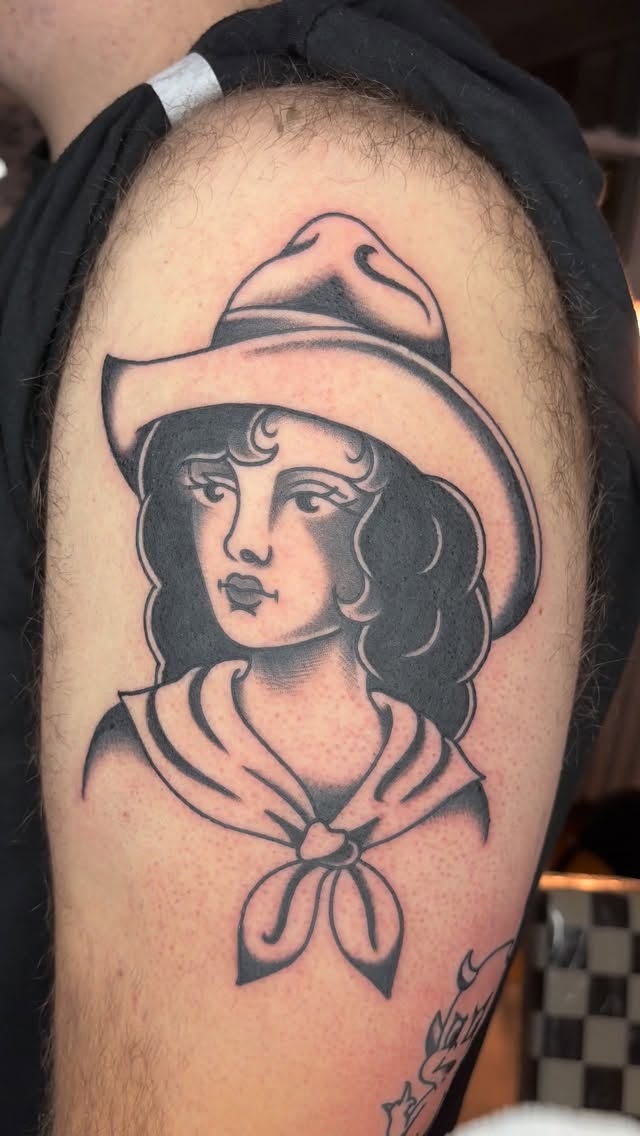 Bold blackwork cowgirl portrait with wide-brim hat