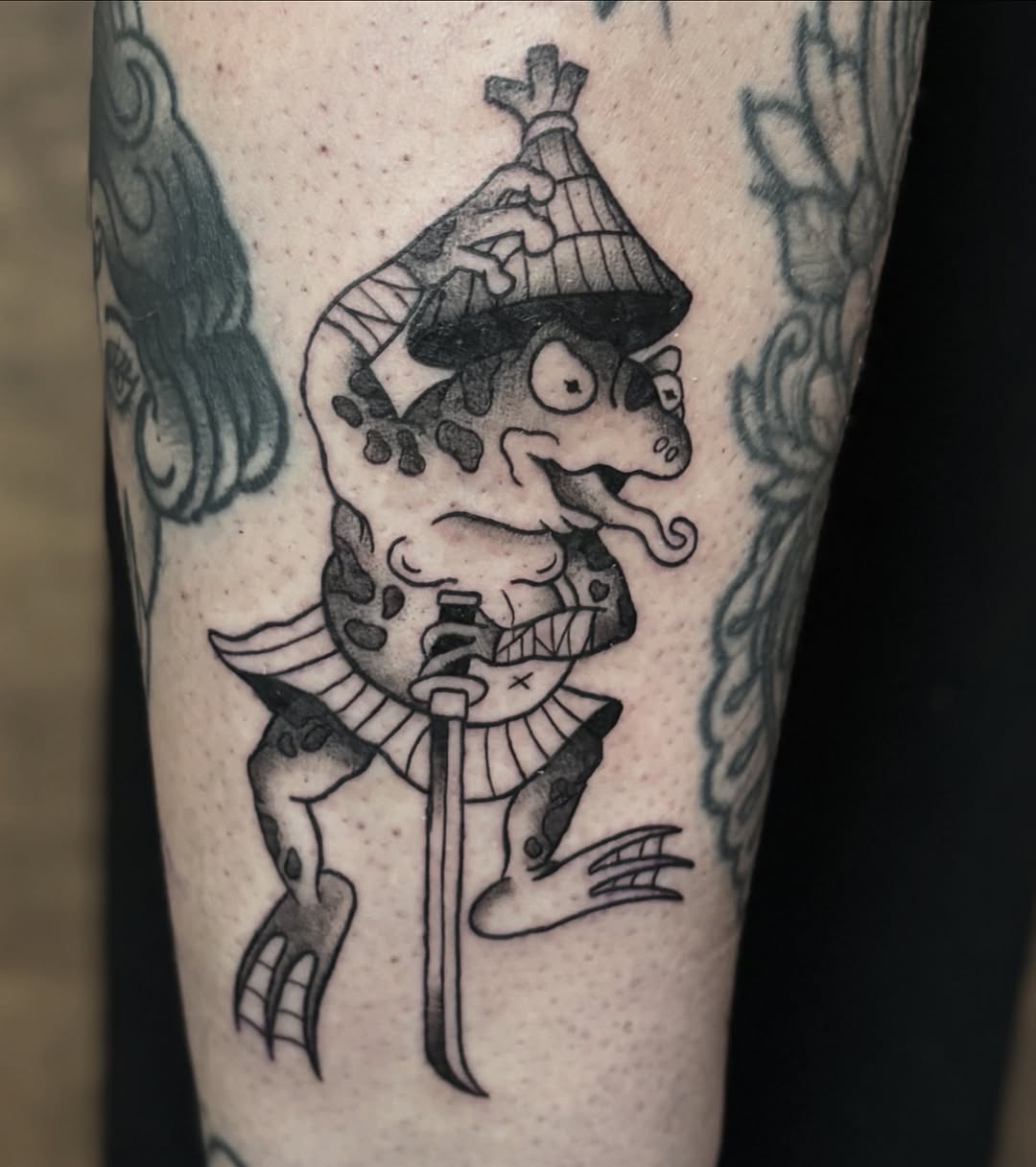 Playful samurai frog with bold linework and sword
