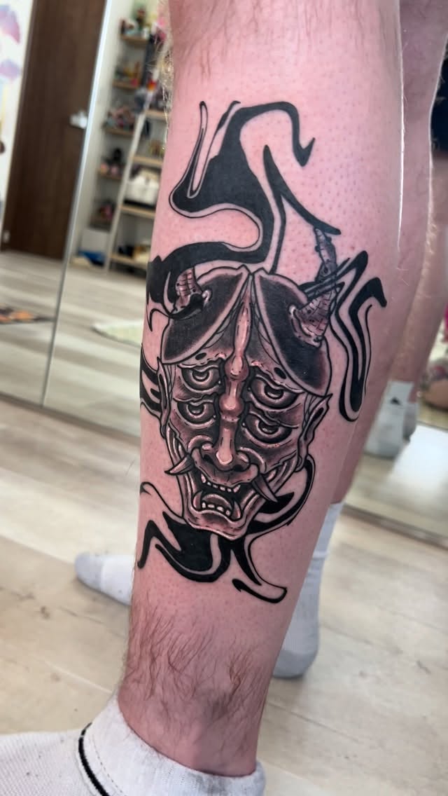 Intense Hannya mask with fluid abstract swirls
