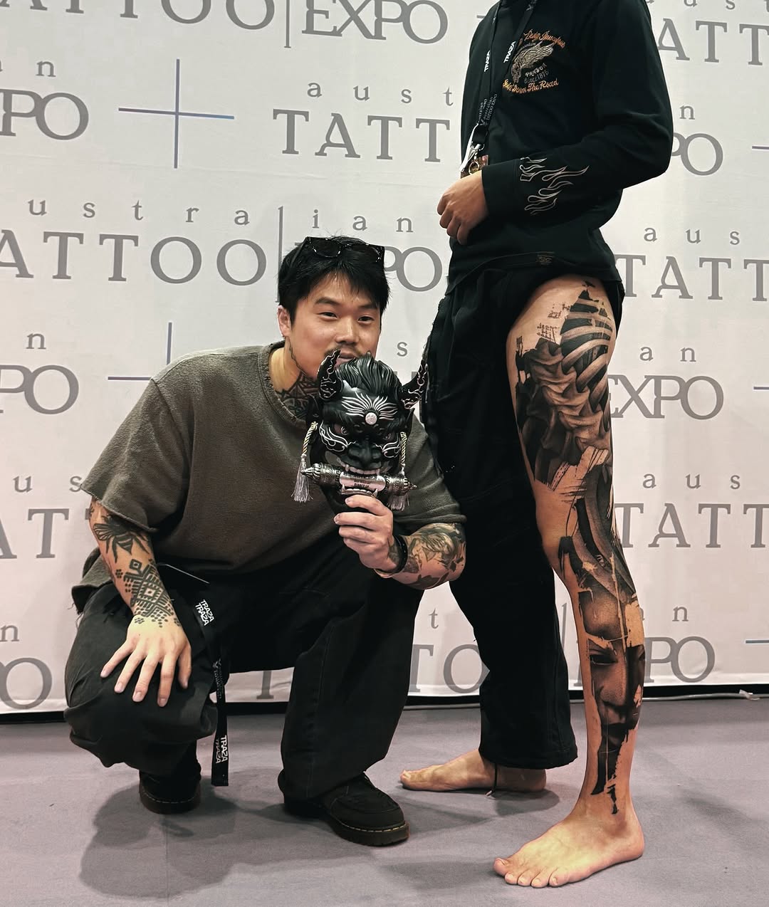 Bold blackwork leg sleeve with geometric shards