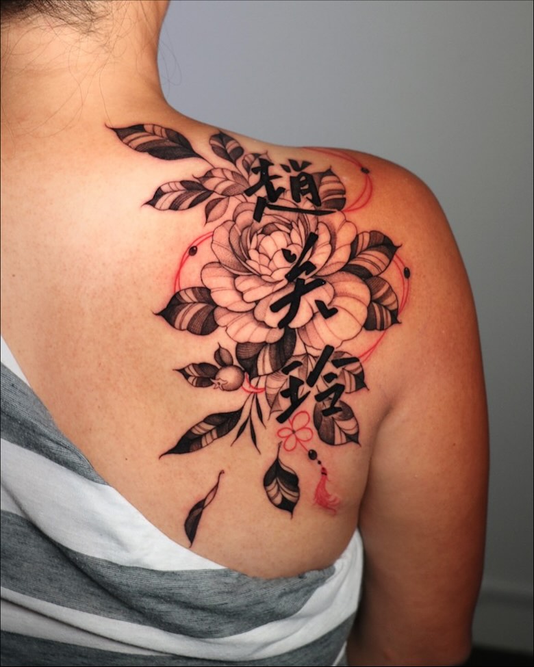 Delicate black-and-gray floral shoulder piece with kanji and red accents