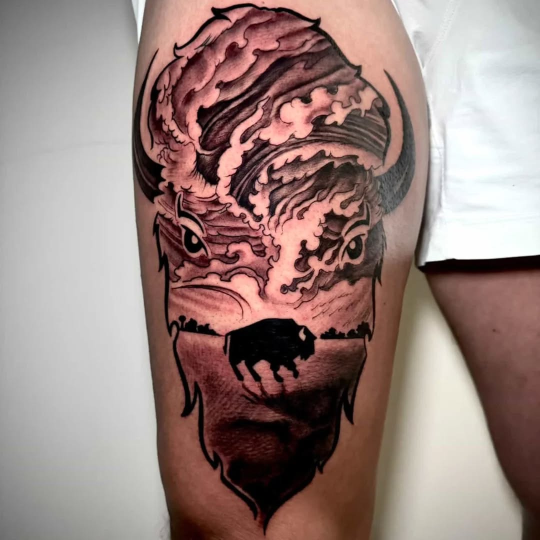 Storm-driven bison silhouette within curling, wind-swept landscape.