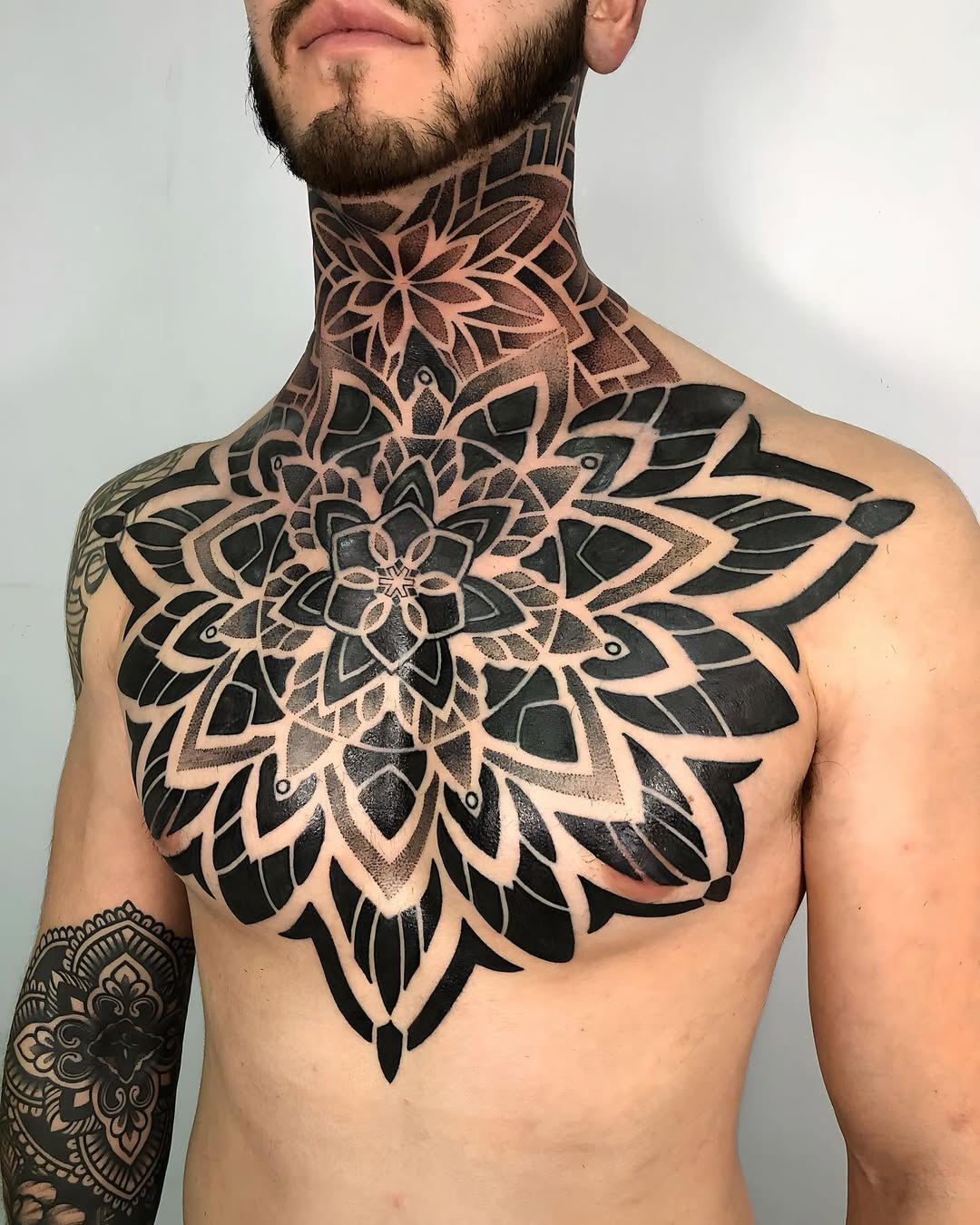 Large blackwork mandala chest and neck piece with dot shading